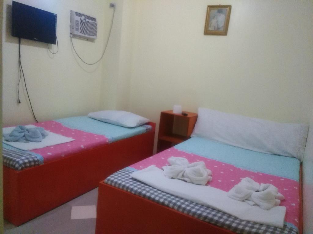 Aranas-Carillo Travellers Inn Kalibo Værelse billede