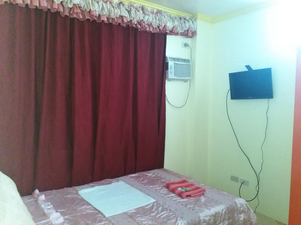 Aranas-Carillo Travellers Inn Kalibo Værelse billede